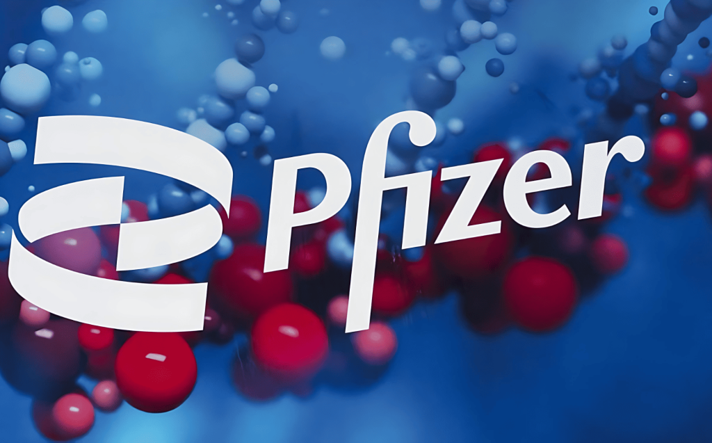Logo de Pfizer sobre fondo azul con esferas rojas y azules.
