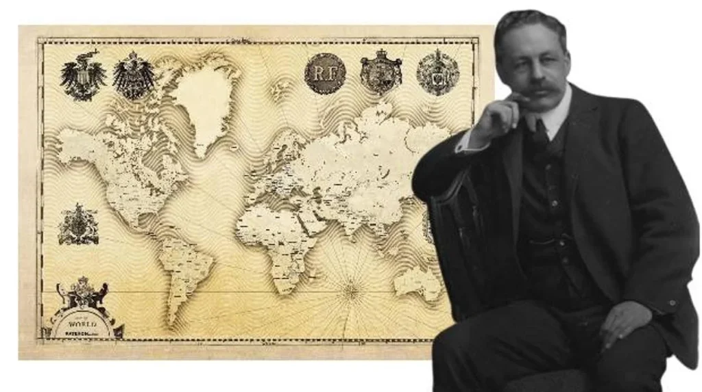 Hombre pensativo junto a un antiguo mapa mundial decorativo.